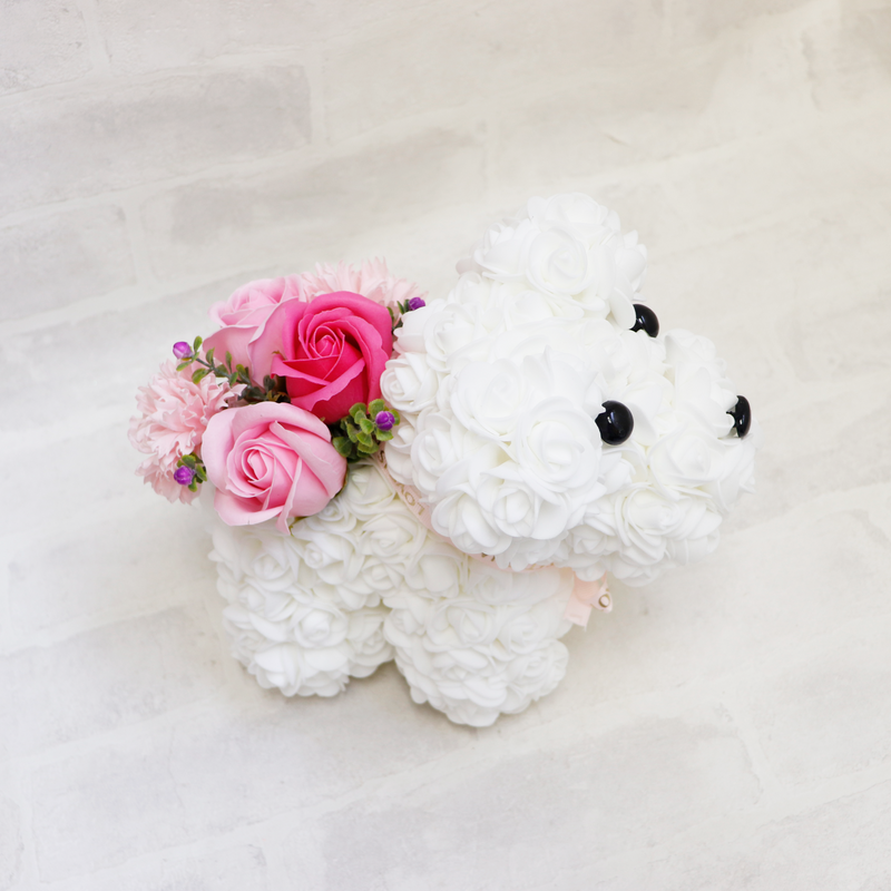 sweet puppy with flowers white